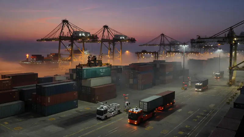 Automated container port with gantry cranes at dusk — Latest Byte China Innovation Tour